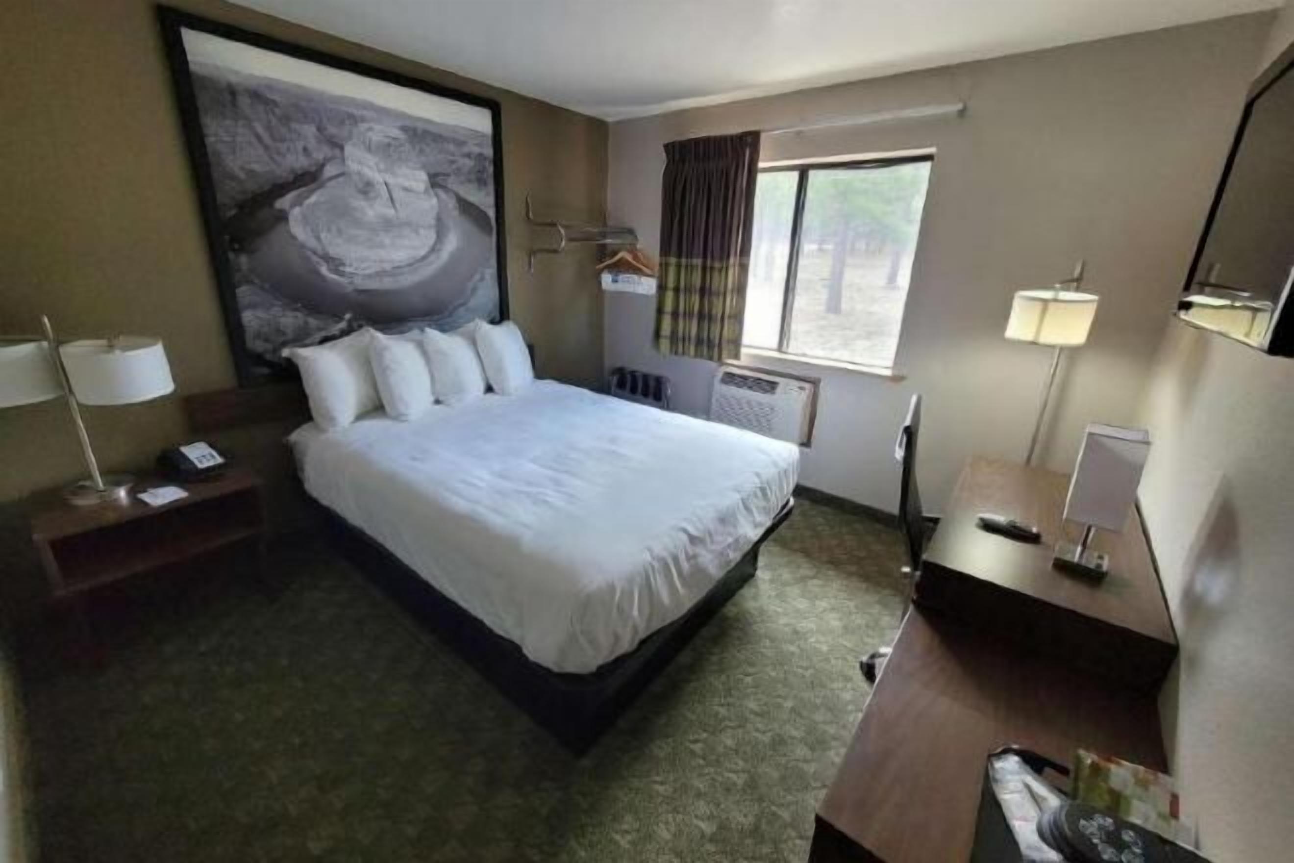 Desk, laptop workspace, free WiFi, bed sheets