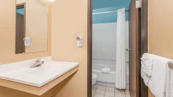 Room, 1 King Bed, Non Smoking (Pet Friendly) | Bathroom | Combined shower/tub, free toiletries, hair dryer, towels