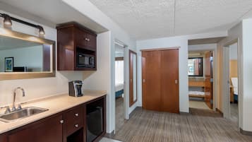 Suite, 1 King Bed | Down comforters, in-room safe, desk, laptop workspace