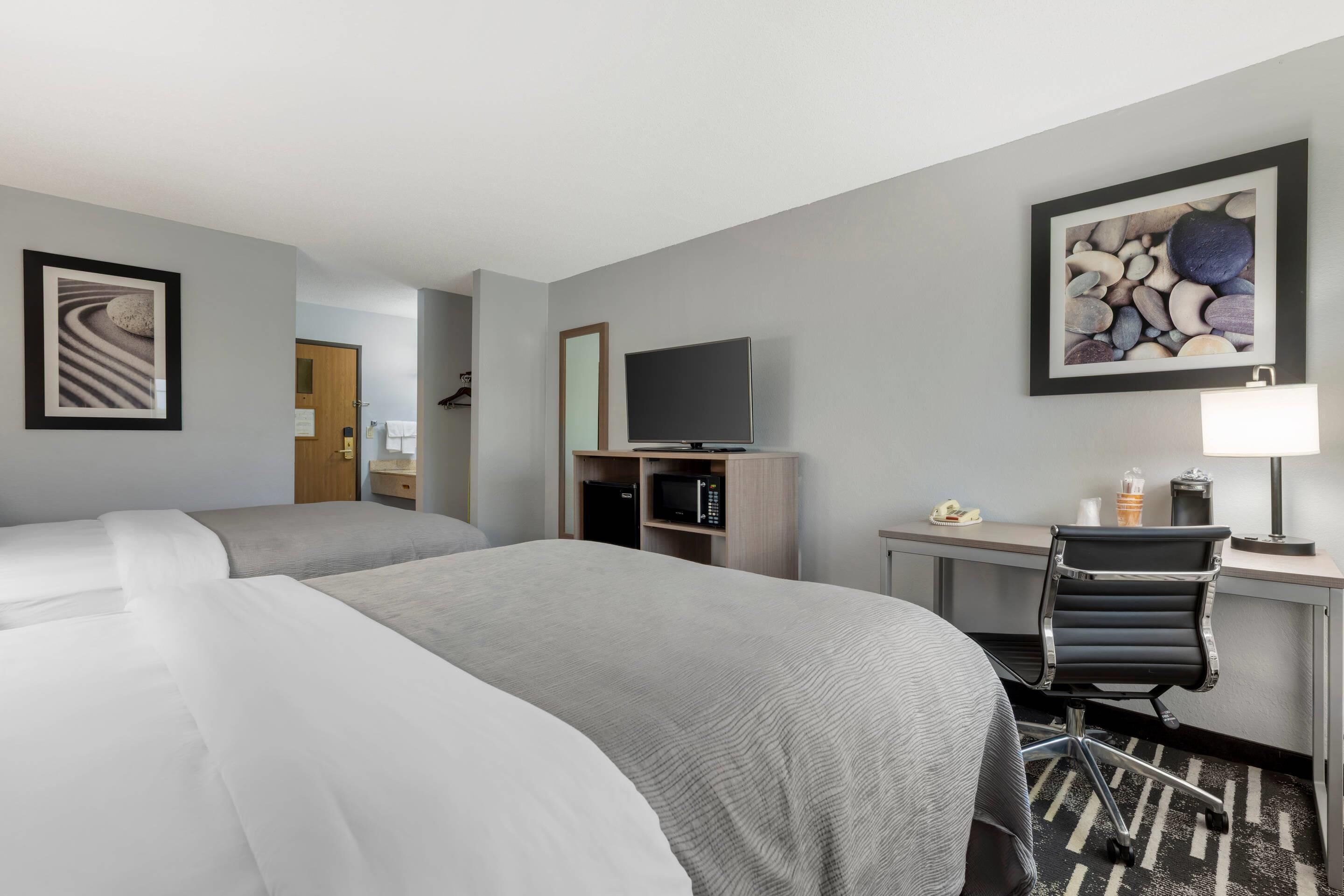 Down duvets, desk, laptop workspace, blackout curtains