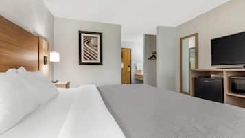 Standard Room, 1 King Bed, Non Smoking | Down comforters, desk, laptop workspace, blackout drapes