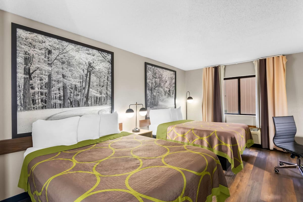 Habitación estándar, 2 camas Queen size | Escritorio, cortinas blackout, cunas gratuitas y camas extra