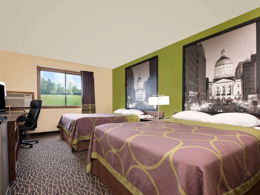 Standard Room, 2 Queen Beds | Desk, iron/ironing board, free cribs/infant beds, free WiFi