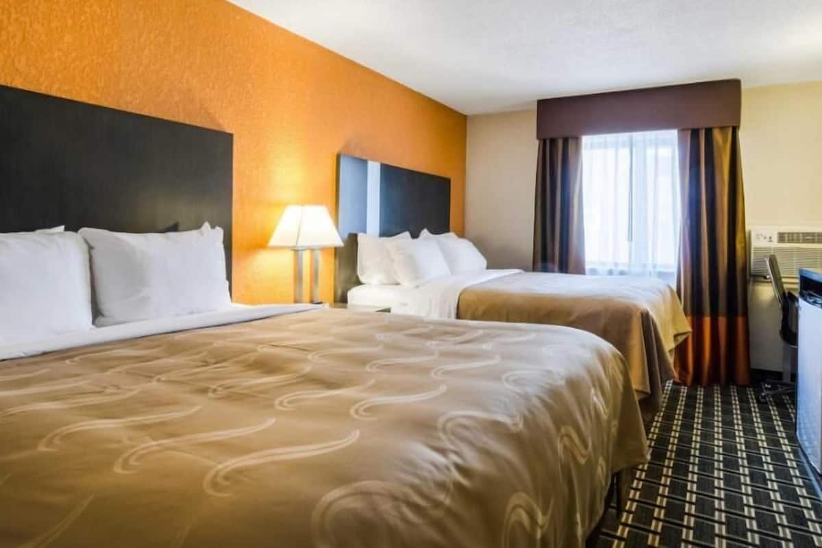 Premium bedding, desk, blackout curtains, iron/ironing board