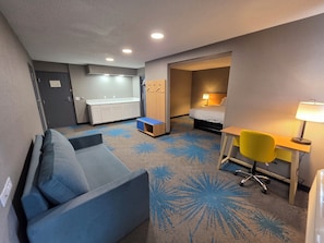 Suite, 1 King Bed, Non Smoking | Iron/ironing board, rollaway beds, free WiFi, bed sheets