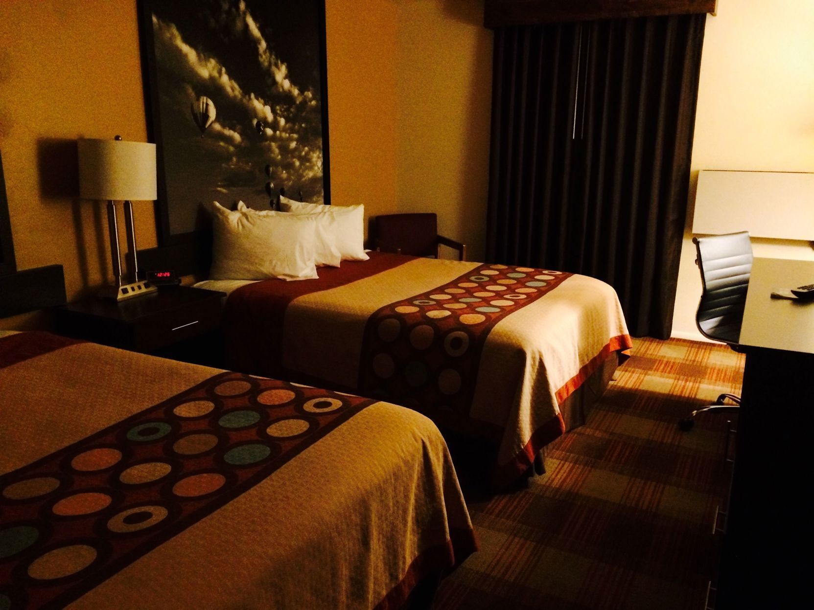 Desk, laptop workspace, blackout curtains, travel cot