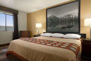Desk, laptop workspace, blackout drapes, travel crib