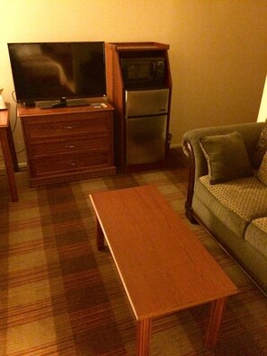 Desk, laptop workspace, blackout drapes, travel crib