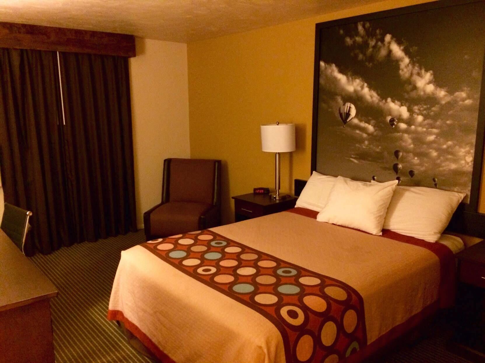 Desk, laptop workspace, blackout curtains, travel cot
