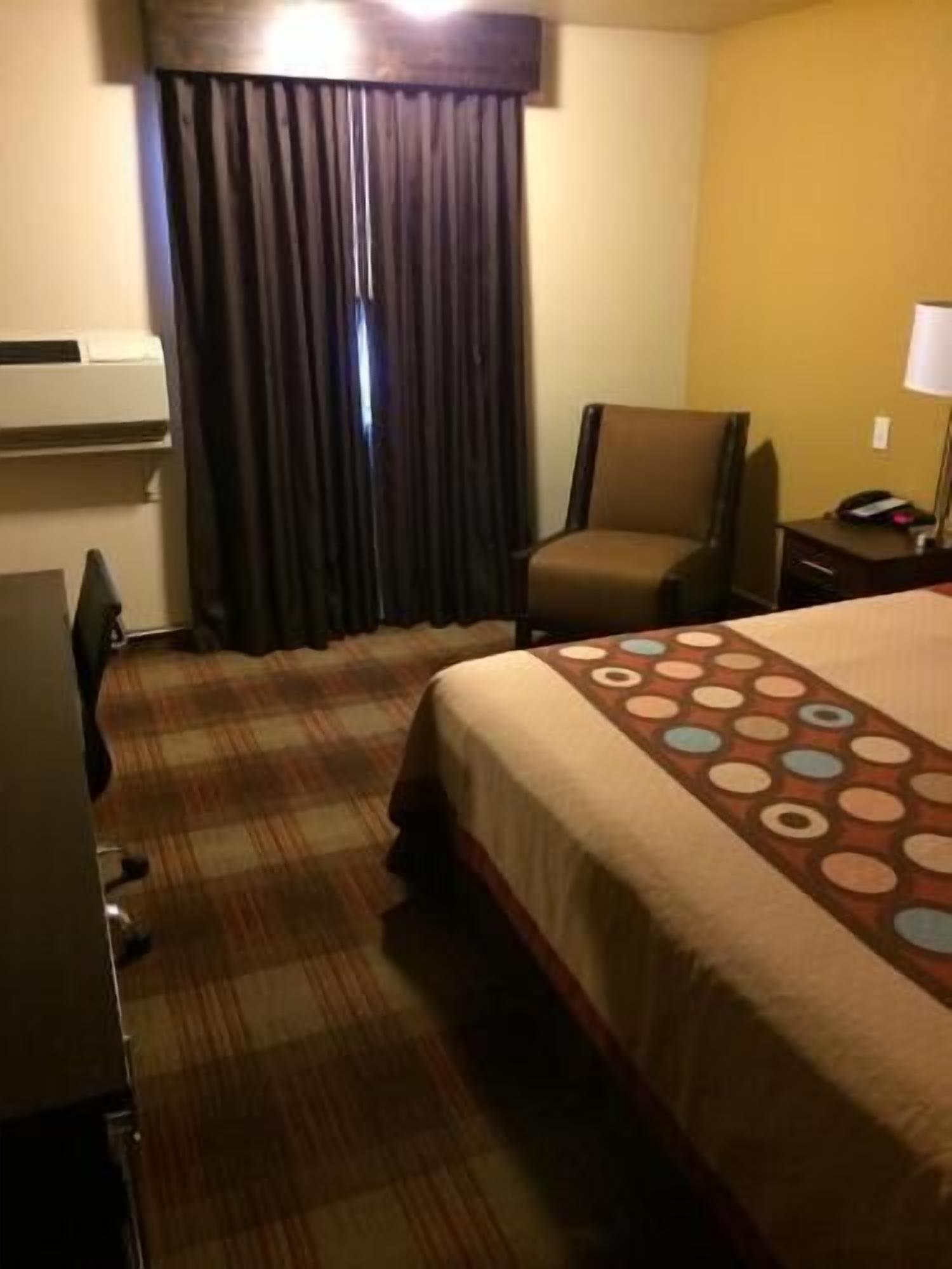 Desk, laptop workspace, blackout curtains, travel cot