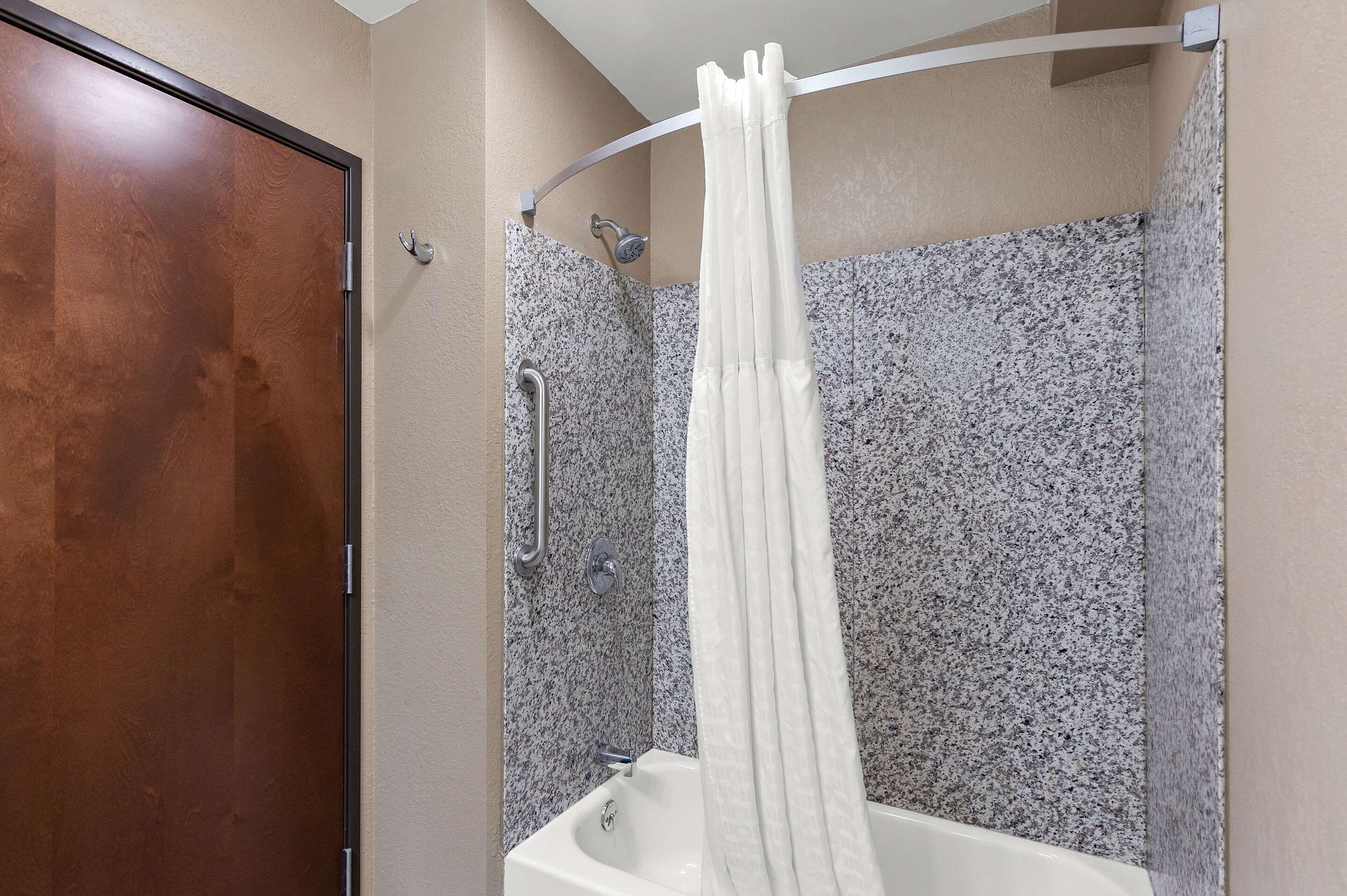 combined shower/bathtub, free toiletries, hair dryer, towels