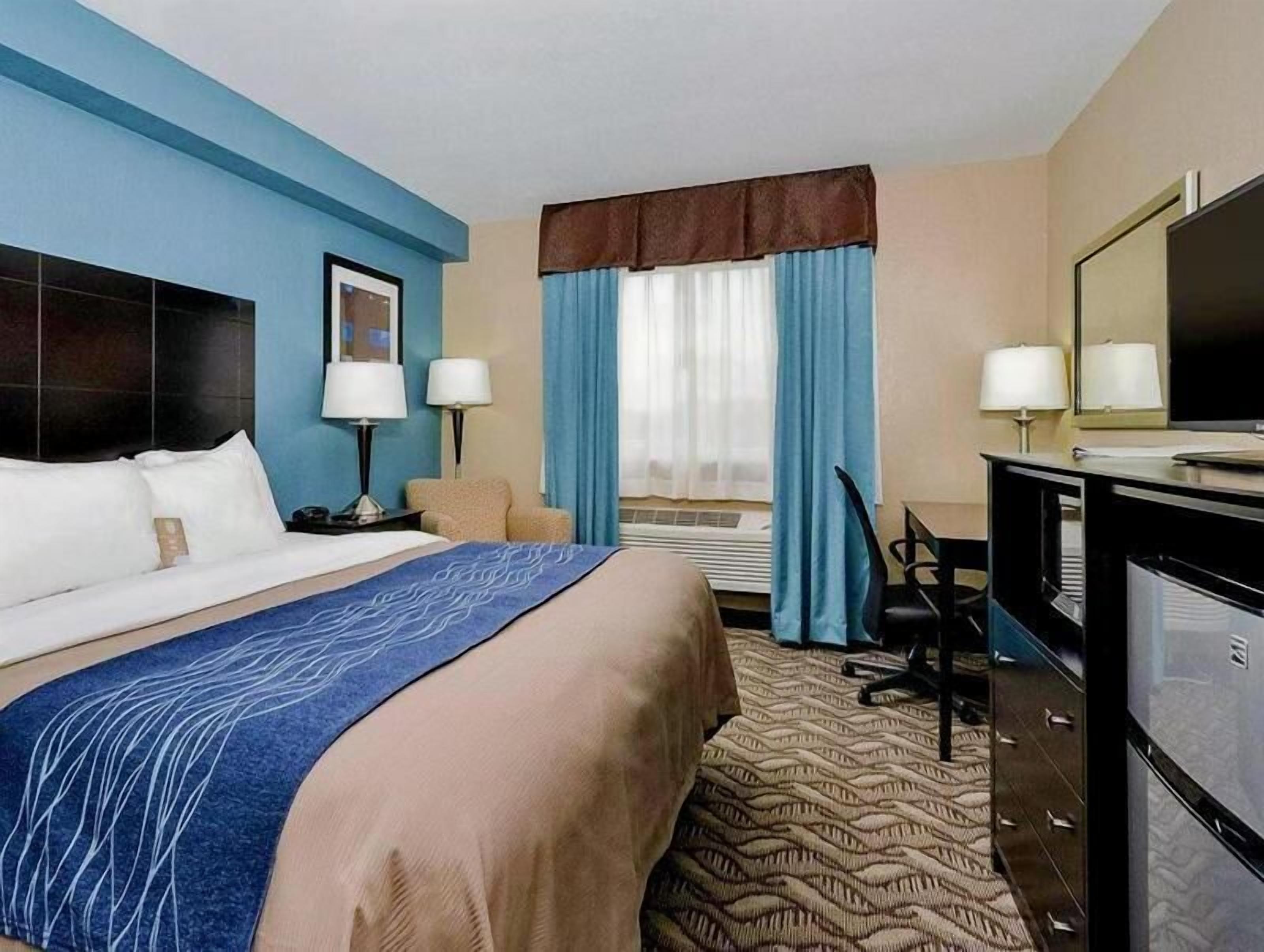 Down comforters, desk, blackout drapes, soundproofing