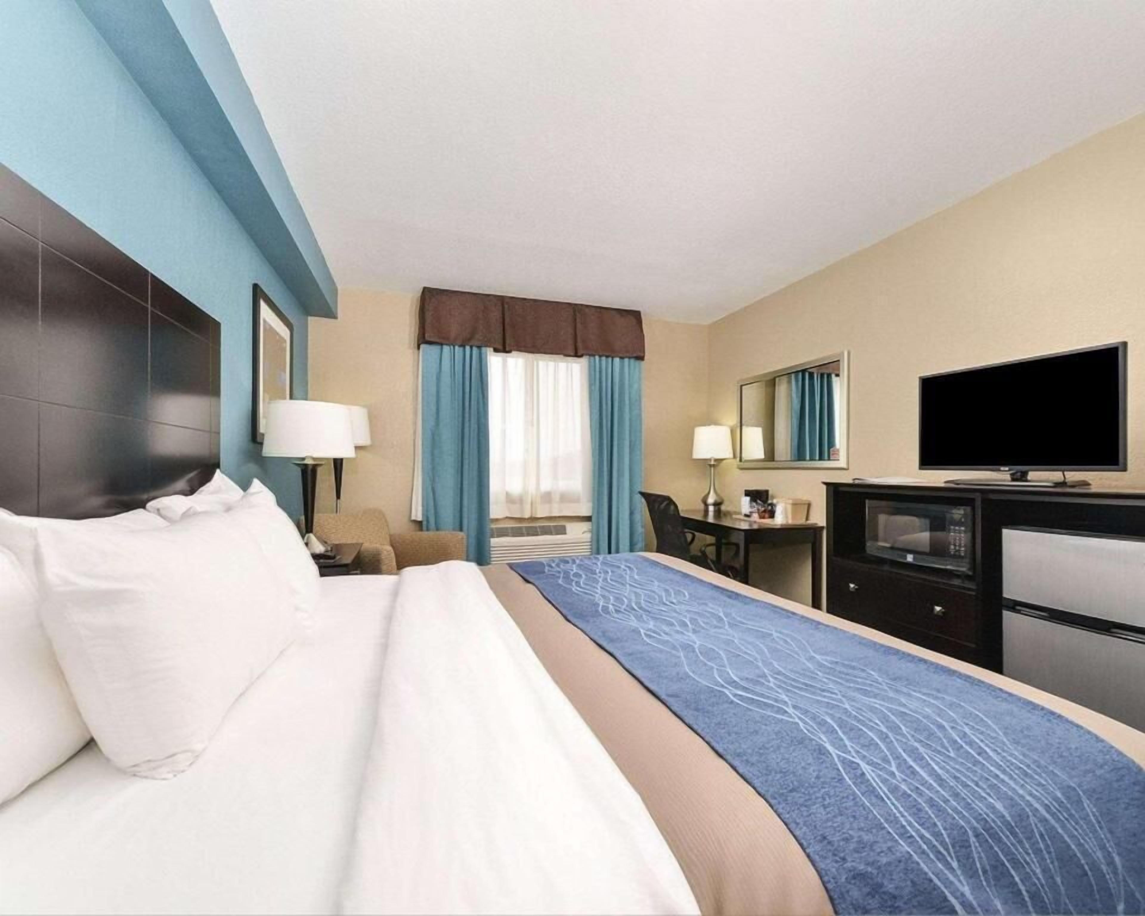 Down comforters, desk, blackout drapes, soundproofing