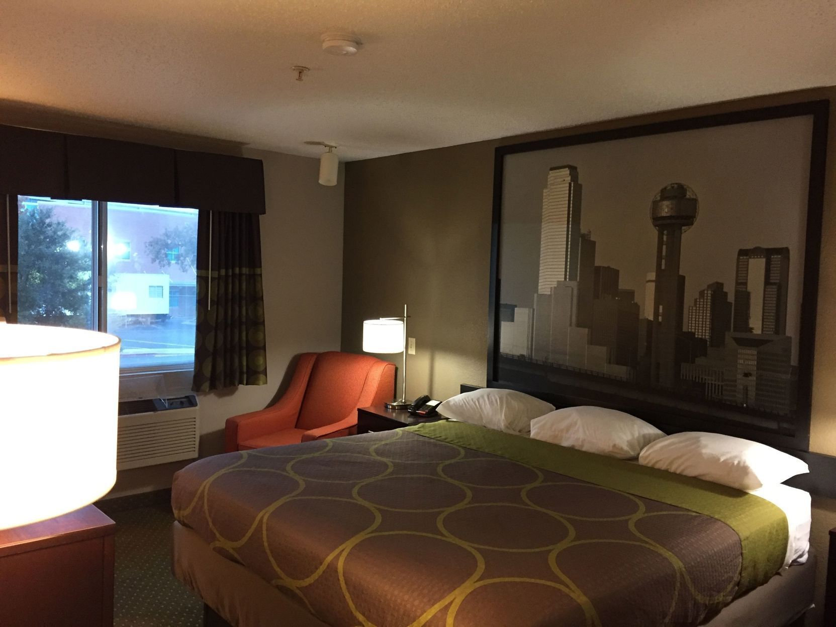 Desk, laptop workspace, blackout drapes, iron/ironing board