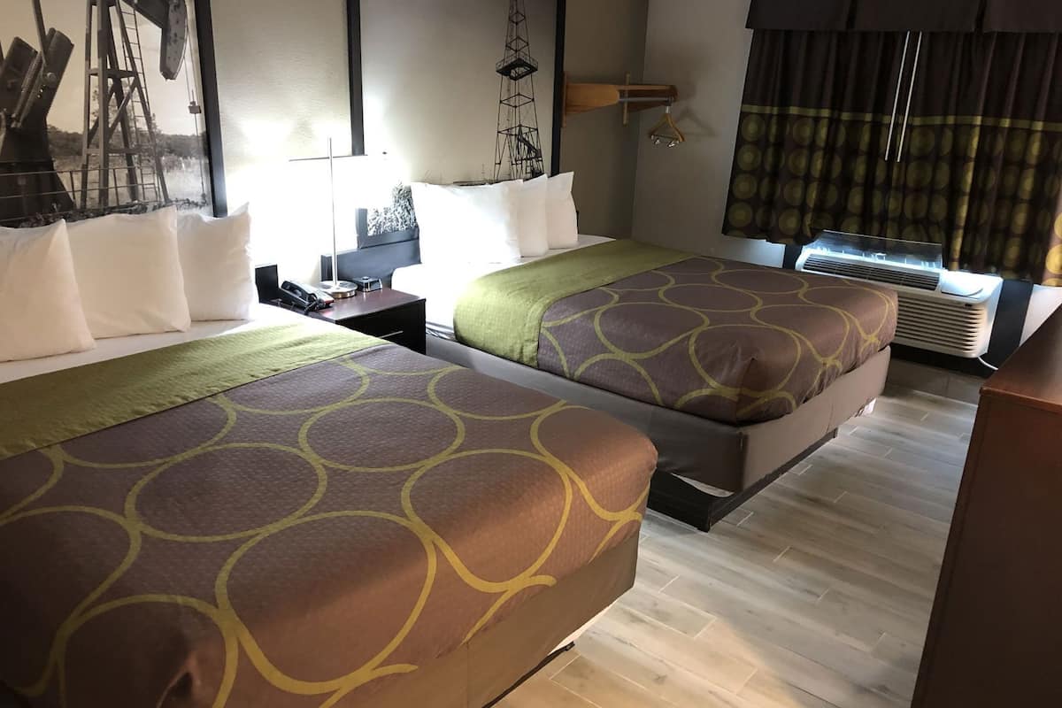 Desk, laptop workspace, blackout curtains, iron/ironing board