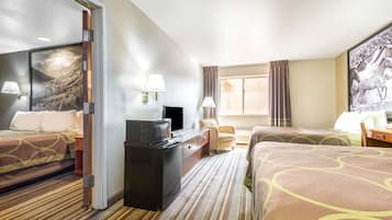 Suite, 1 King Bed | Desk, blackout curtains, iron/ironing board, free cots/infant beds