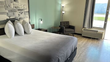 Queen bed non smoking mobility access tub w grab bars | Living area