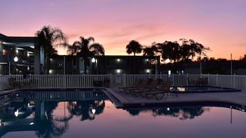 2 outdoor pools, open 9 AM to 10 PM, pool umbrellas, pool loungers