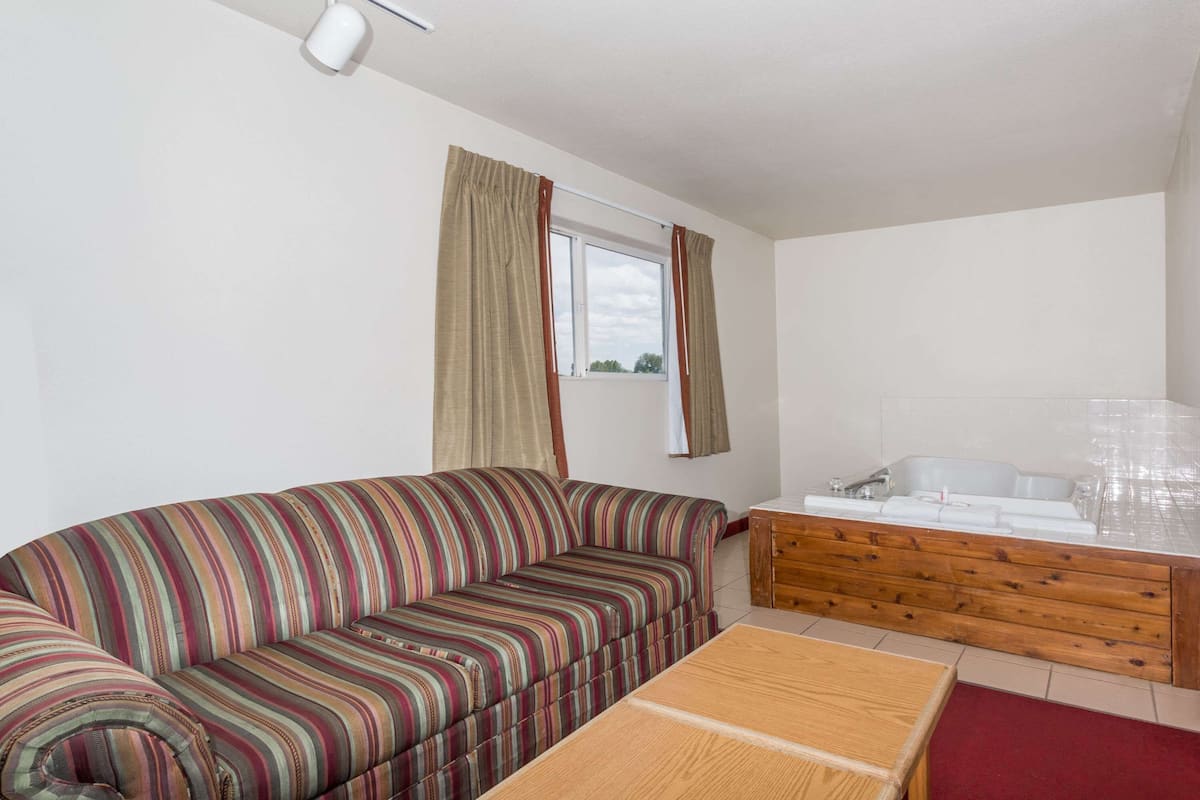 Suite, 1 King Bed | Iron/ironing board, free cots/infant beds, rollaway beds, free WiFi