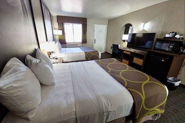 Desk, laptop workspace, blackout drapes, iron/ironing board