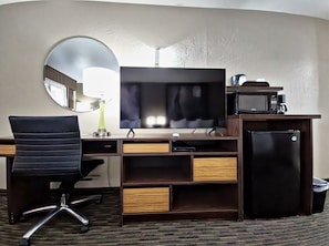Desk, laptop workspace, blackout drapes, iron/ironing board