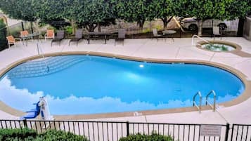 Outdoor pool, open 10:00 AM to 10:00 PM, sun loungers