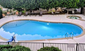 Outdoor pool, open 10:00 AM to 10:00 PM, sun loungers