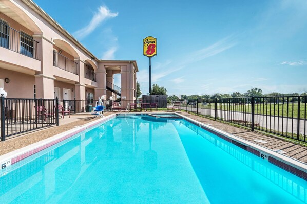 Seasonal outdoor pool, pool loungers