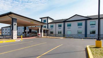 Guests can park their vehicles in the hotel's spacious parking lot.