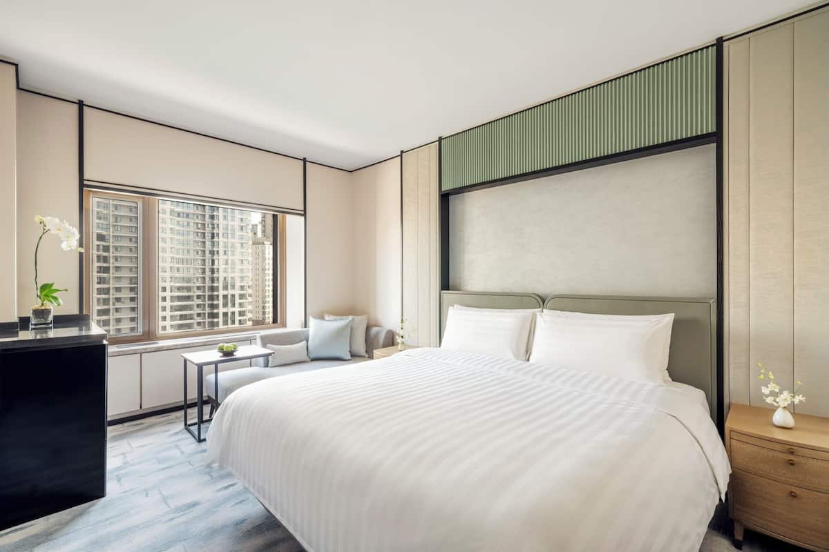 Premium bedding, down comforters, minibar, in-room safe