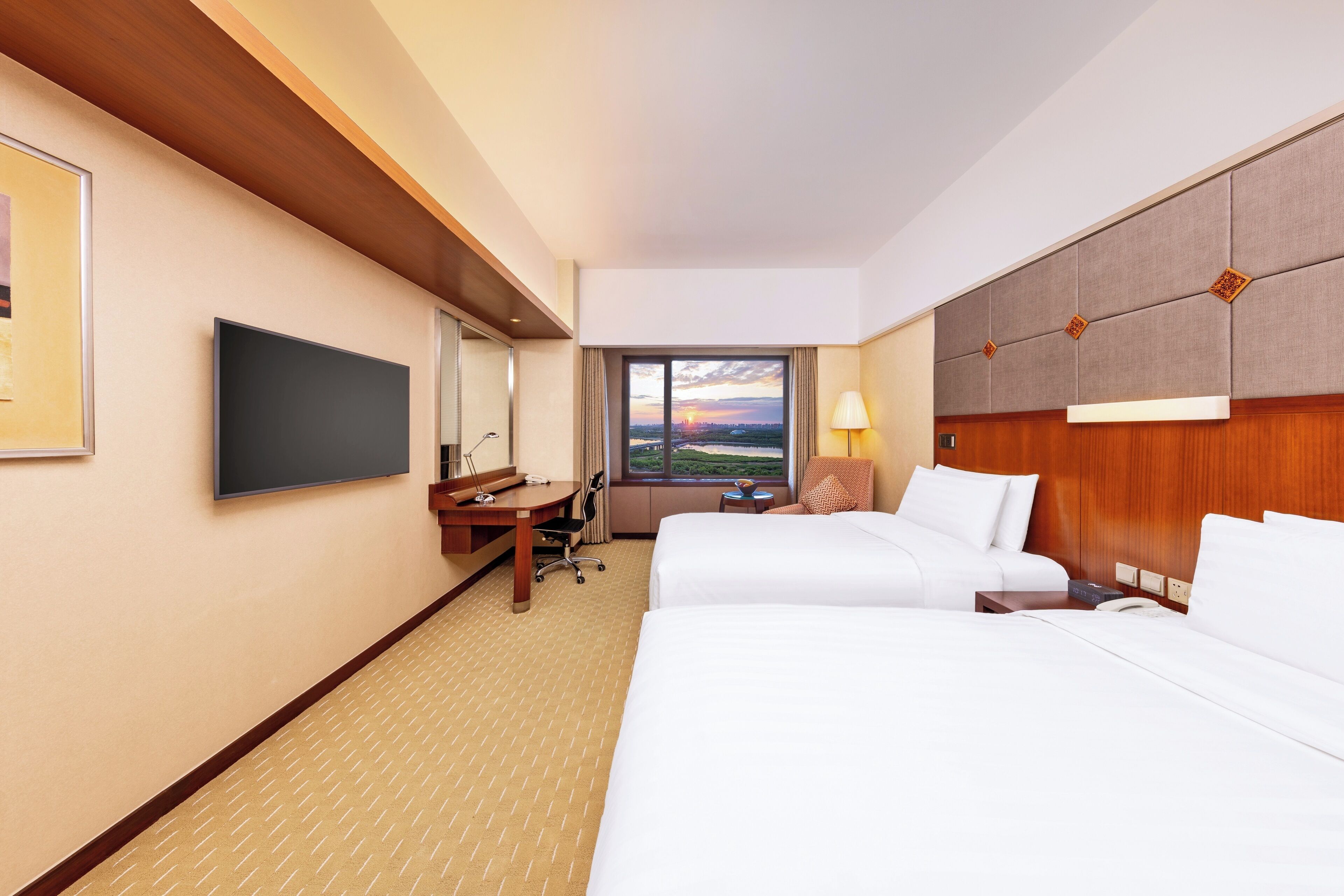 Premium bedding, down comforters, minibar, in-room safe