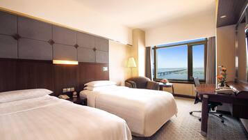 Premium bedding, down comforters, minibar, in-room safe