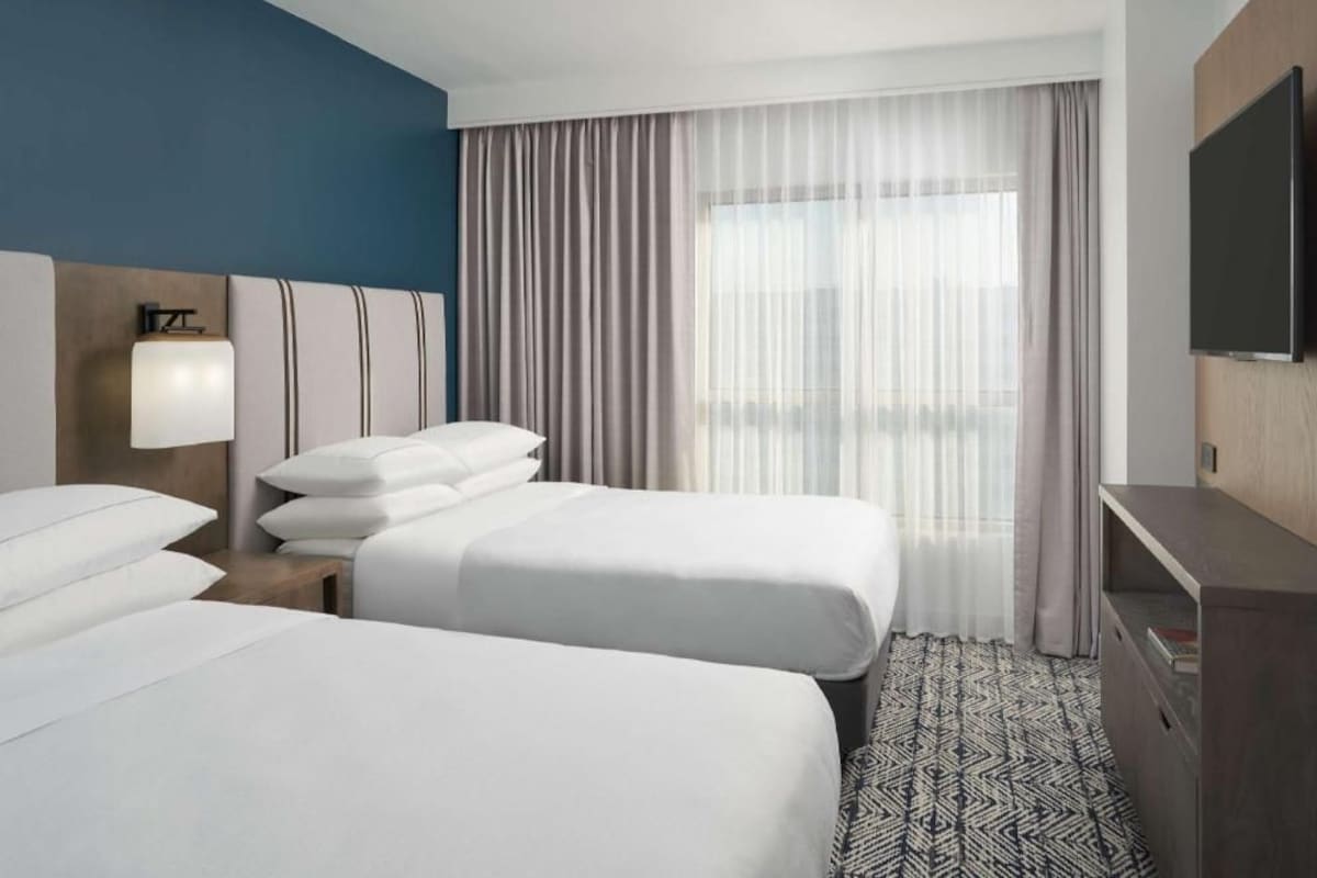 Premium bedding, down duvets, pillow-top beds, in-room safe