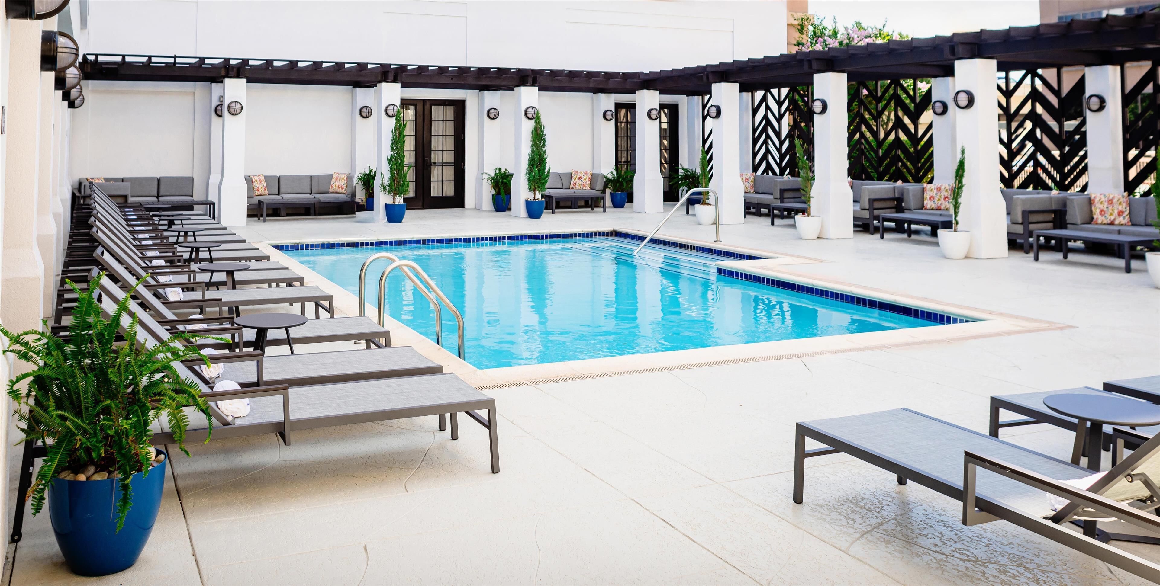 Outdoor pool, open 10:00 AM to 10:00 PM, sun loungers