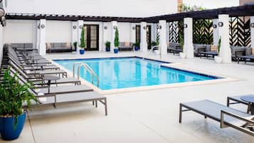 Outdoor pool, open 10:00 AM to 10:00 PM, sun loungers