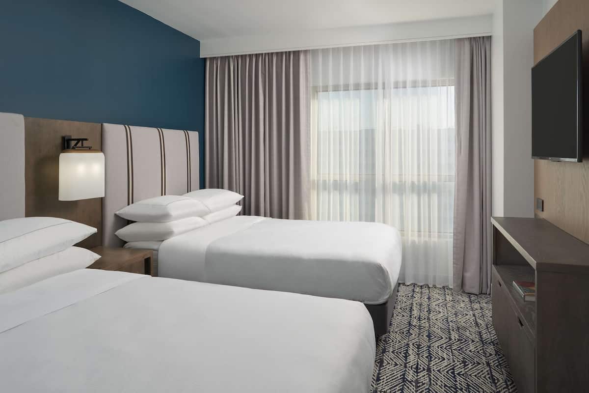 Premium bedding, down comforters, pillowtop beds, in-room safe