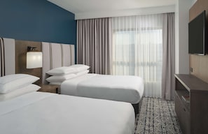 Premium bedding, down duvets, pillow-top beds, in-room safe