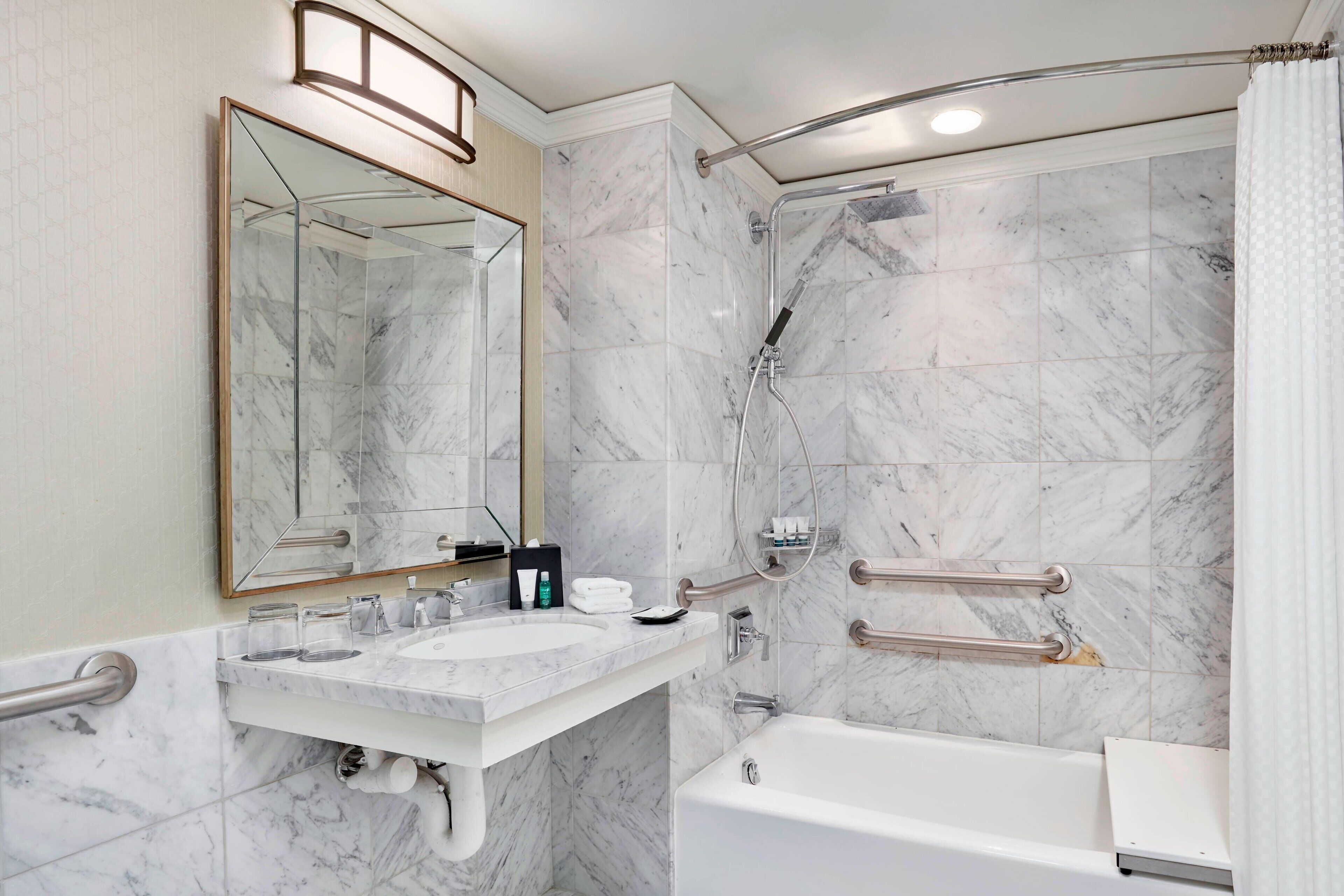 combined shower/bathtub, rainfall showerhead, designer toiletries