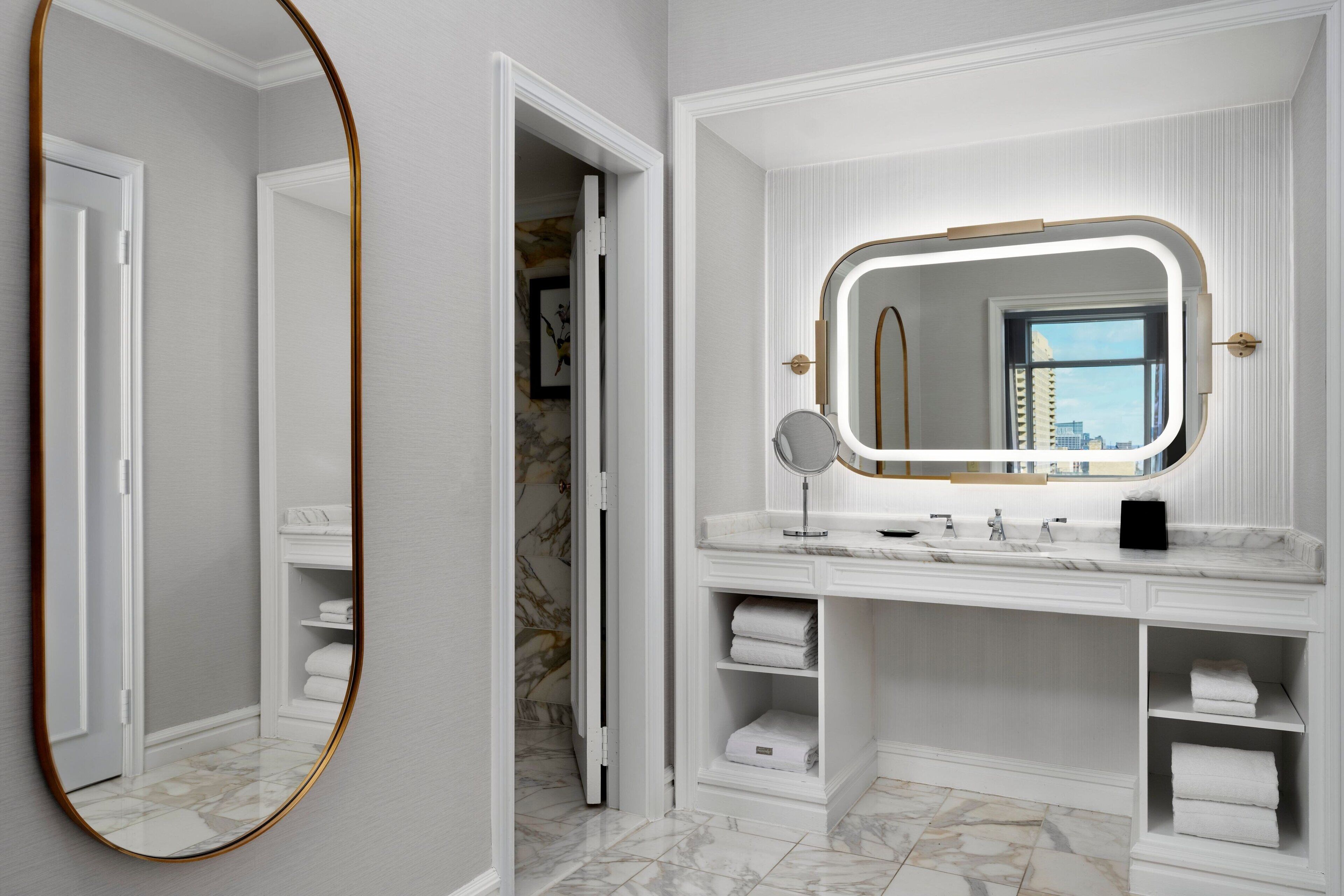 combined shower/bathtub, rainfall showerhead, designer toiletries