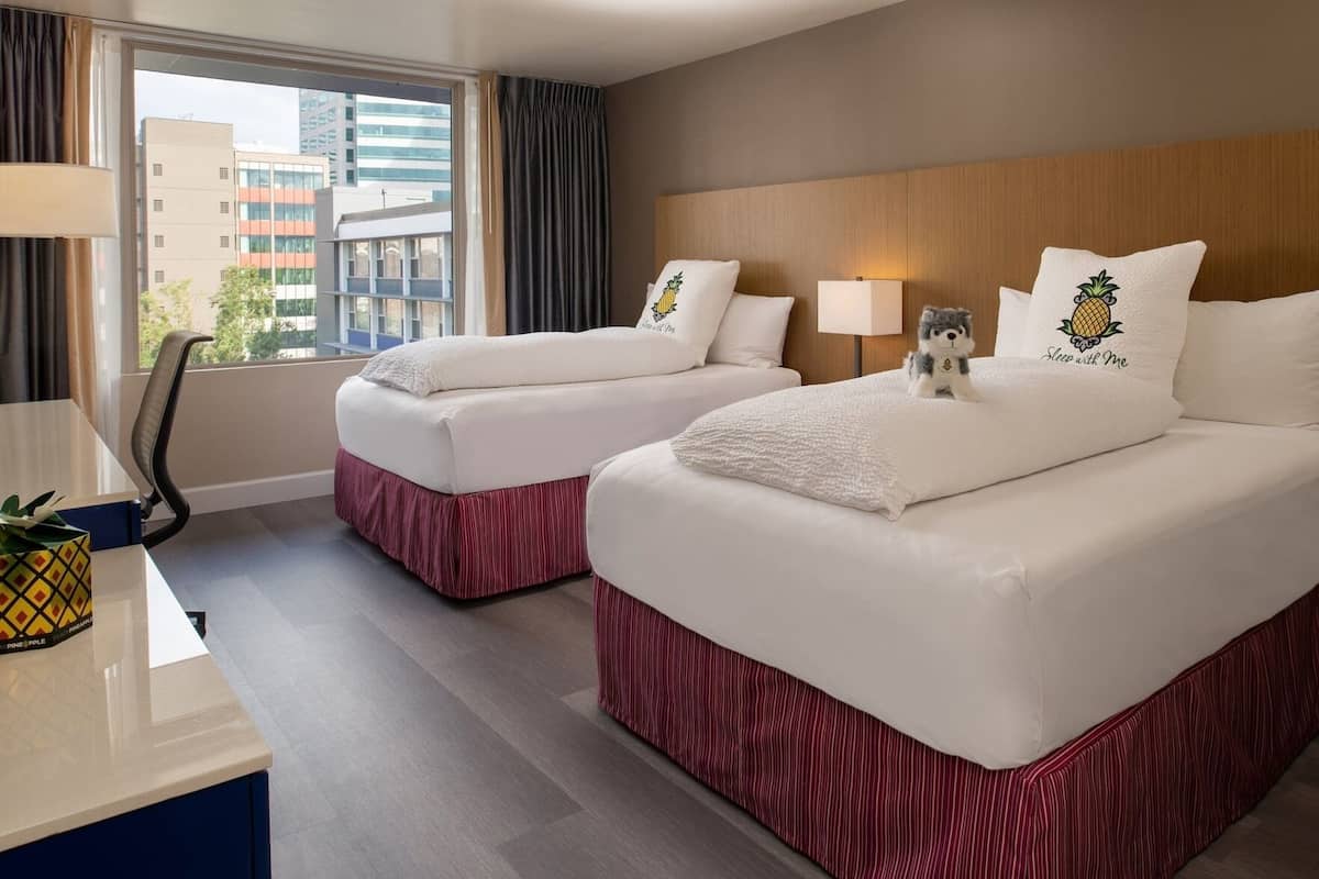 Premium bedding, down comforters, pillowtop beds, in-room safe