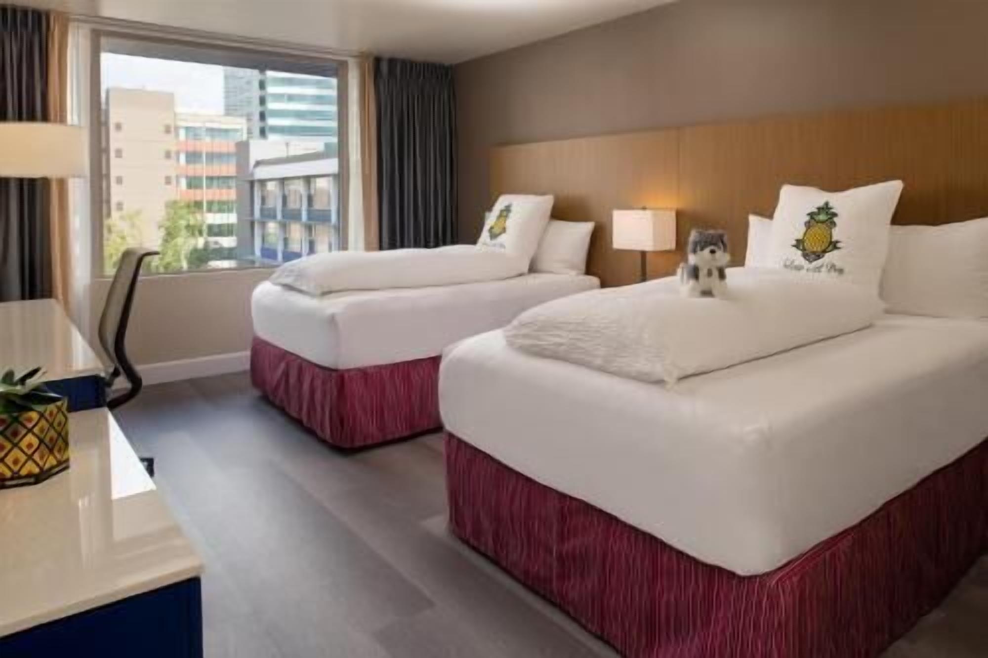 Premium bedding, down comforters, pillowtop beds, in-room safe