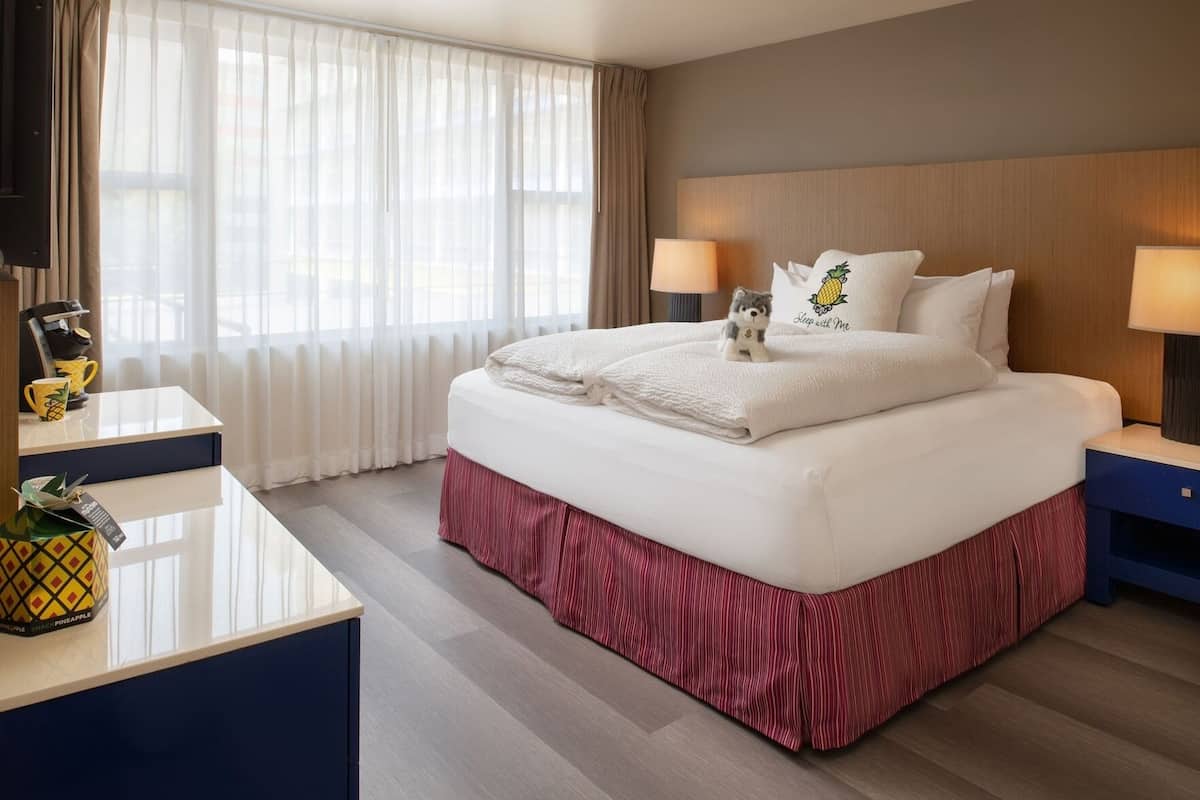 Premium bedding, down comforters, pillowtop beds, in-room safe