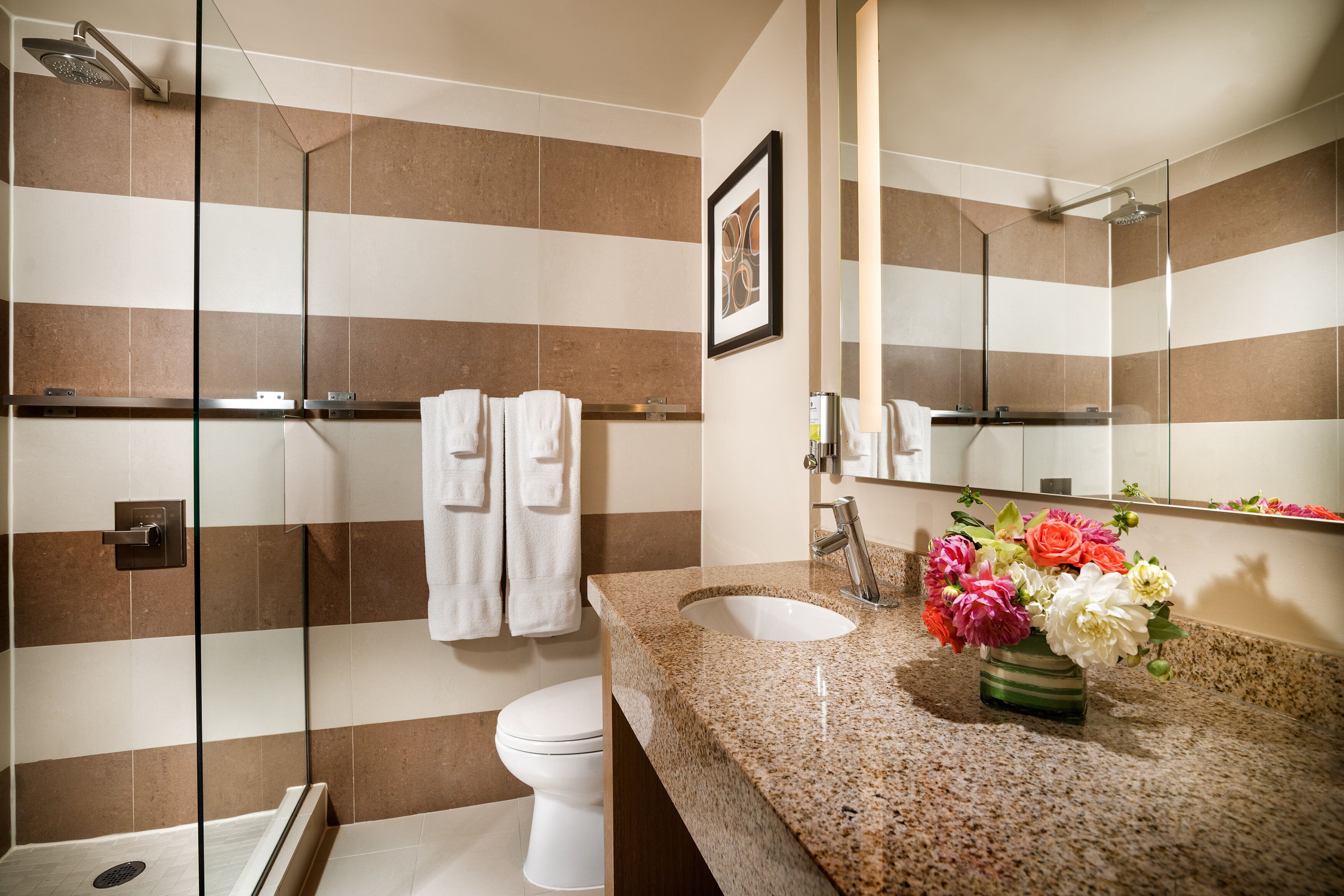 designer toiletries, hair dryer, bathrobes, towels