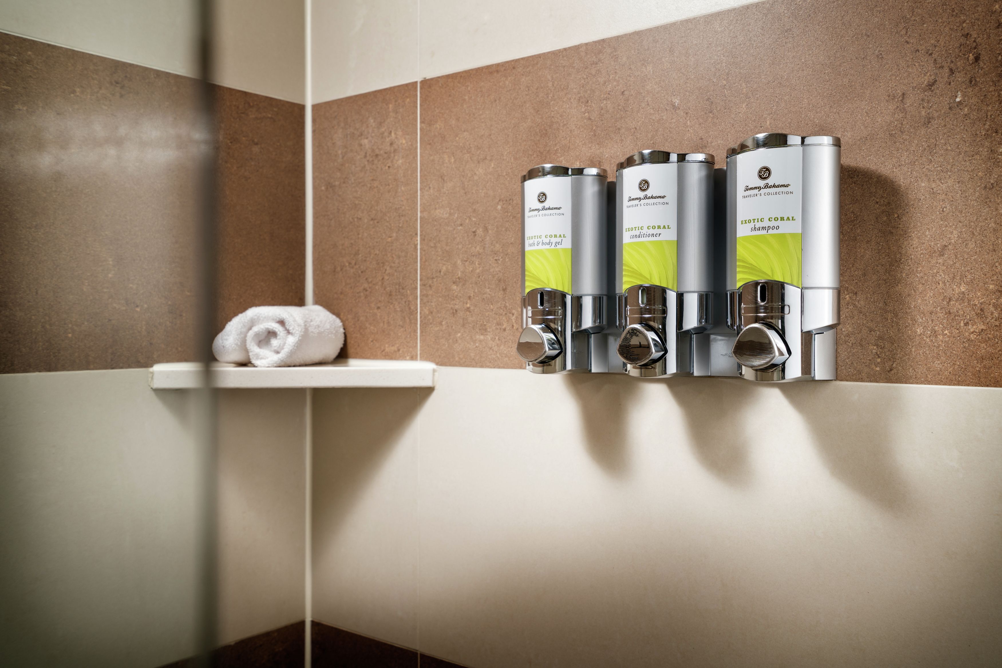 designer toiletries, hair dryer, bathrobes, towels