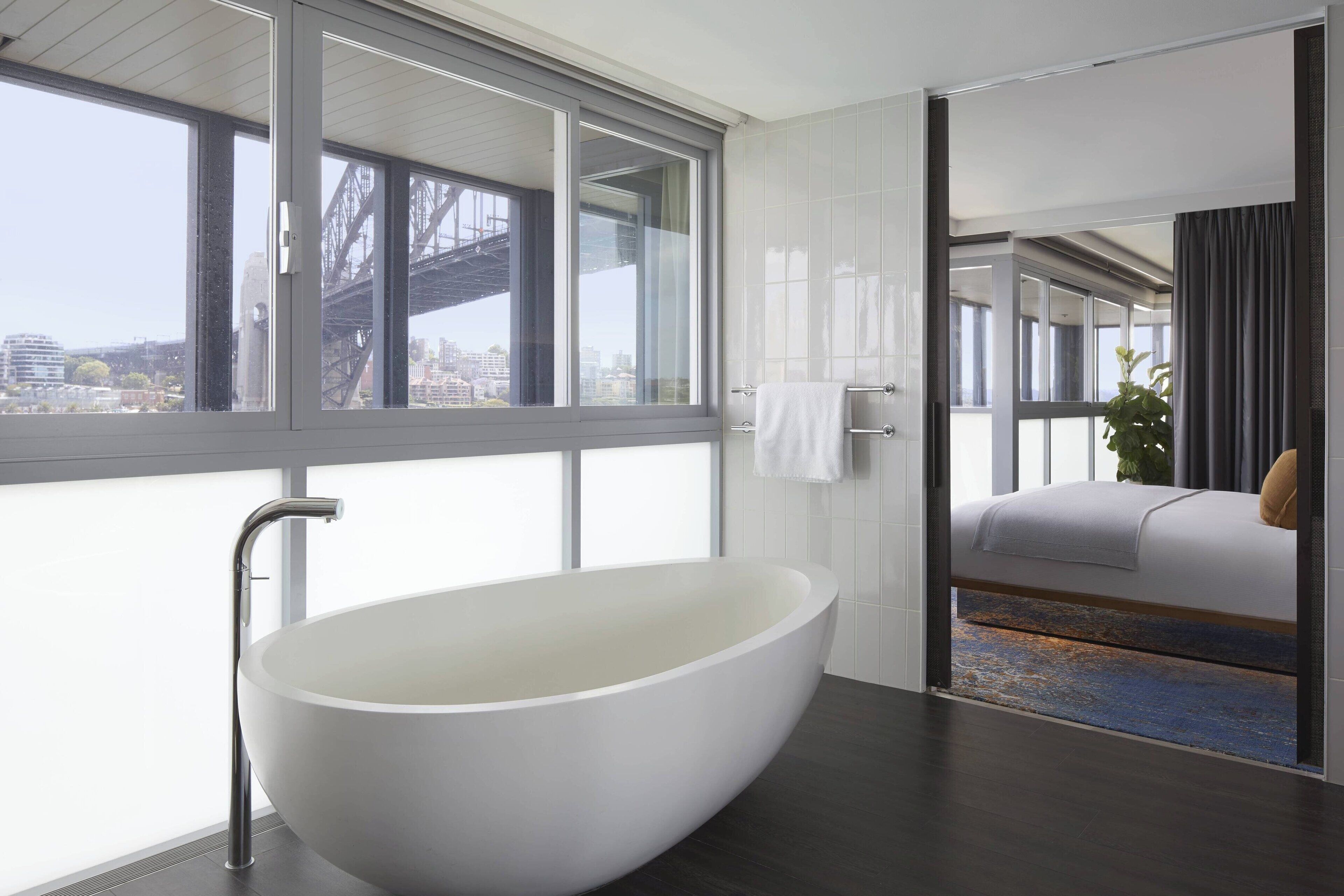 suite, 1 king bed, non smoking | bathroom | designer toiletries, hair dryer, bathrobes, slippers