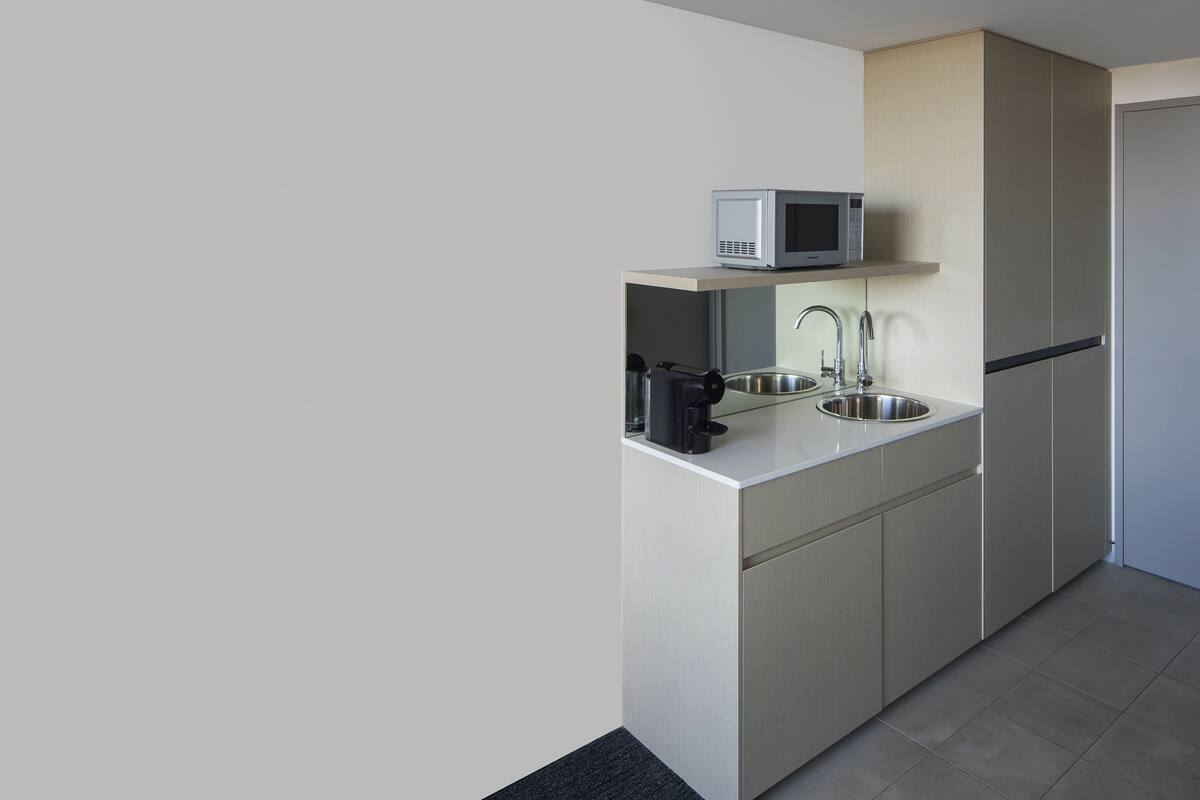 superior room, 1 queen bed | private kitchen | mini-fridge, microwave, coffee/tea maker, electric kettle