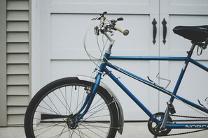 Guests can exercise with a stationary bicycle in the garage.