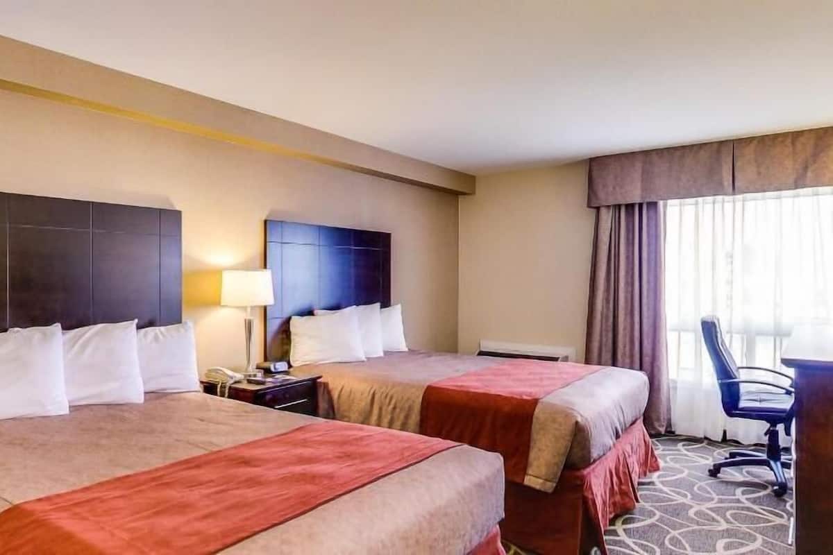 Blackout drapes, iron/ironing board, rollaway beds, free WiFi