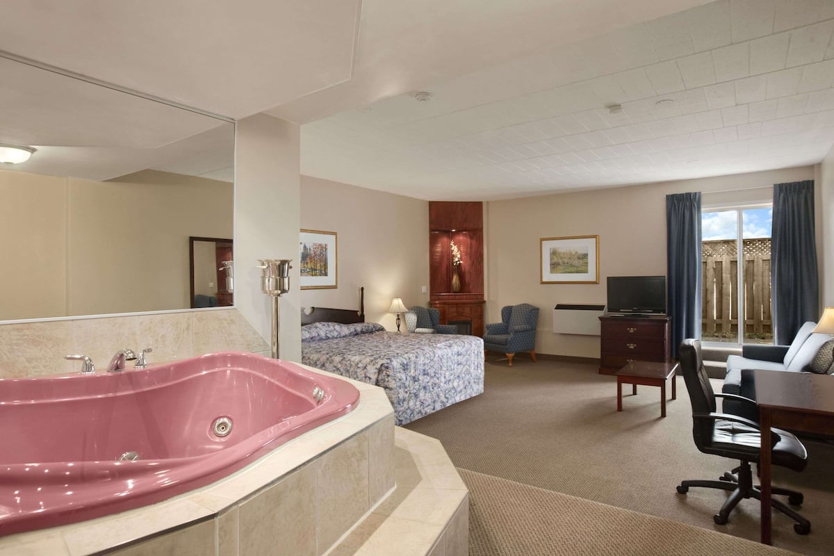 Blackout drapes, iron/ironing board, rollaway beds, free WiFi