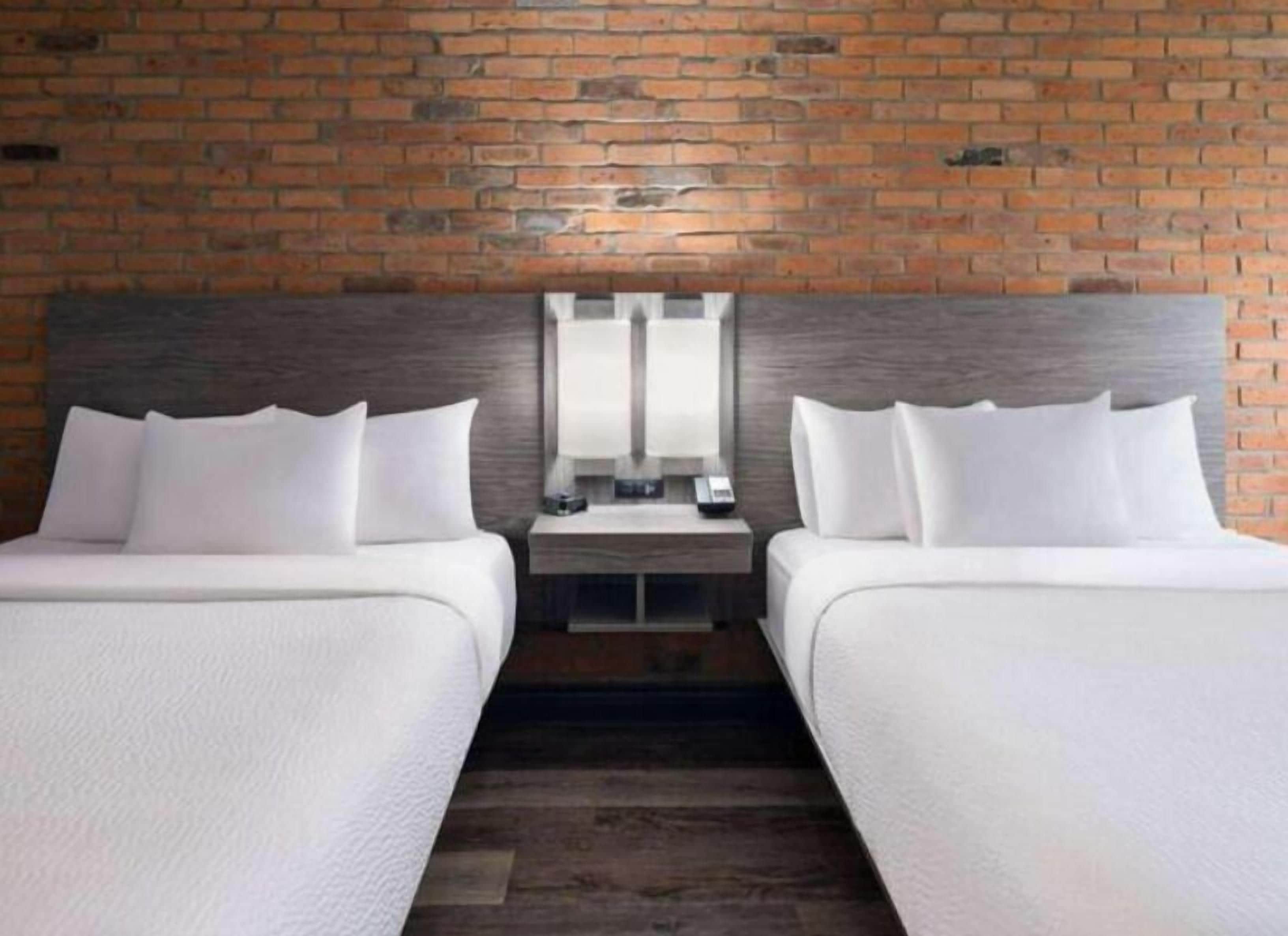 Deluxe Room, 2 Queen Beds, Non Smoking | Egyptian cotton sheets, premium bedding, pillow-top beds, desk